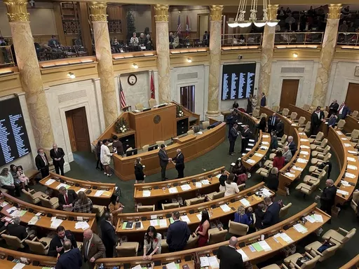 Arkansas lawmakers gather in the House of Representatives chamber at the state Capitol in Little Rock, Ark. on Monday, Jan. 9, 2023. Arkansas lawmakers are convening at the Capitol and their top agenda item is taking up Gov. Sarah Huckabee Sanders' $6.3 billion proposed budget for the coming year. (AP Photo/Andrew DeMillo, File)