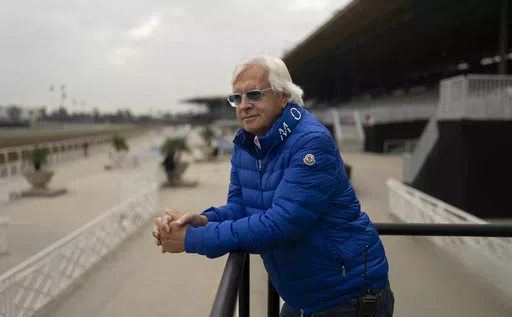 Trainer Bob Baffert stands for a photo ahead of the Breeders' Cup horse races at Santa Anita in Arcadia, Calif., Oct. 27, 2023. A judge has denied a request by the owner of Baffert-trained Arkansas Derby winner Muth for the colt to run in next month’s 150th Kentucky Derby at Churchill Downs. Jefferson County (Ky.) Circuit Judge Mitch Perry declined Thursday, April 18, to grant a temporary injunction to Zedan Racing Stables, which had argued that the ban of Baffert was “illegal.” (AP Photo/