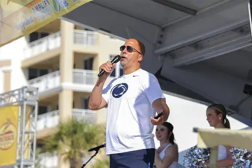 Penn State coach James Franklin speaks to the crowd during the Outback Bowl Clearwater Beach Day on Thursday, Dec. 30, 2021, in Clearwater, Fla. Penn State is scheduled to play Arkansas on New Year's Day. (Arielle Bader/Tampa Bay Times via AP)