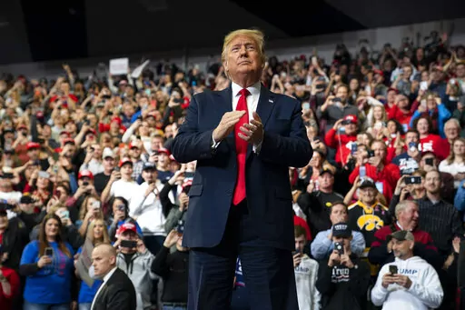President Donald Trump arrives to speak at a campaign rally at the Knapp Center on the campus of Drake University, Jan. 30, 2020, in Des Moines, Iowa. Republican presidential prospects are streaming into Iowa, the leadoff presidential caucus state. Notably absent from the lineup, at least for now, is former President Donald Trump who carried the state twice, by healthy margins, as the Republican presidential nominee in the 2016 and 2020 elections. (AP Photo/ Evan Vucci, File)