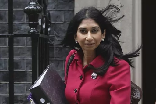 Britain's Home Secretary Suella Braverman leaves 10 Downing Street to go to the Houses of Parliament in London, on May 22, 2023. Braverman said Monday Sept. 11, 2023 she is seeking “urgent advice” on banning a type of American bully dog, highlighting an attack on a 11-year-old girl over the weekend. (AP Photo/Kin Cheung, File)