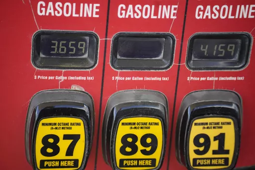 The prices of the various grades of gasoline available are displayed electronically on a pump at a filling station on Sept. 18, 2023, in Newcastle, Wyo. Oil prices have risen, meaning drivers are paying more for gasoline and truckers and farmers more for diesel. The increase also is complicating the global fight against inflation and feeding Russia's war chest to boot. (AP Photo/David Zalubowski, File)