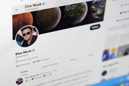 The Twitter page of Elon Musk is seen on the screen of a computer in Sausalito, Calif., on Monday, April 25, 2022.  Twitter wants a Delaware court to order Elon Musk to buy the social media service for $44 billion, as he promised back in April. But suppose a judge makes that ruling and Musk balks? The Tesla billionaire's reputation for dismissing government pronouncements has some worried about how he’d react to an unfavorable ruling of the Delaware Court of Chancery, known for its handling of