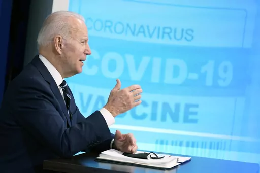President Joe Biden speaks about the government's COVID-19 response, in the South Court Auditorium in the Eisenhower Executive Office Building on the White House Campus in Washington, Jan. 13, 2022. President Joe Biden has gotten the updated COVID-19 vaccine and annual flu shot, the White House said Saturday, Sept. 23, 2023. (AP Photo/Andrew Harnik, File)