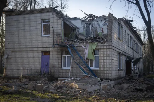A damaged kindergarten following a Russian drone attack in Kyiv, Ukraine, Saturday, Nov. 25, 2023. Russia launched its most intense drone attack on Ukraine since the beginning of its full-scale invasion on Saturday morning, military officials said. (AP Photo/Efrem Lukatsky)