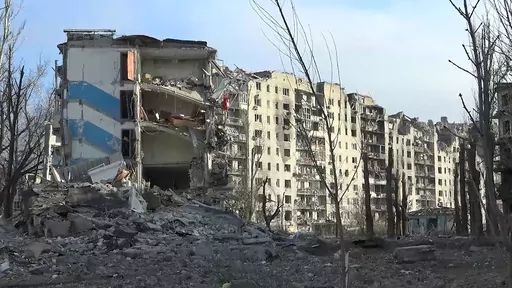 This photo taken from video released by the head of the Russian-controlled Donetsk region Denis Pushilin's telegram channel on Saturday, Feb. 24, 2024, shows damaged buildings, after Russian forces completed their takeover of Avdiivka, eastern Ukraine. Russian-controlled Donetsk region. (Head of the Russian-controlled Donetsk region Denis Pushilin telegram channel via AP)