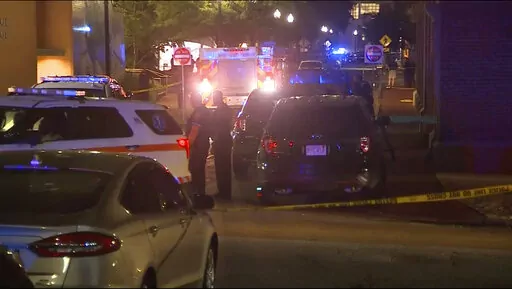 Police and emergency personnel respond the scene of an explosion in Boston, Tuesday, Sept. 13, 2022.   A package exploded on the campus of Northeastern University and the college said a staff member suffered minor injuries. (WCVB via AP)