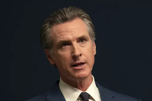 California Gov. Gavin Newsom answers questions during a news conference, Sept, 26, 2023, in Sacramento, Calif. Newsom, who is often at the center of speculation over his national political ambitions, again seized the spotlight beyond the state's borders as he signed laws this year to require major companies to disclose their emissions, raise wages for fast-food workers, and prevent school boards from banning books based on gender and race. (AP Photo/Rich Pedroncelli, File)