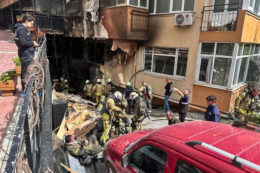 Firefighters work after a fire broke out at a nightclub in Istanbul, Turkey, Tuesday, April 2, 2024. A fire at an Istanbul nightclub during renovations on Tuesday killed at least 27 people, officials and reports said. Several people, including managers of the club, were detained for questioning. (IHA via AP)
