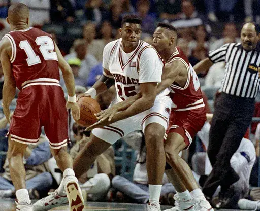 Arkansas' Oliver Miller (25) drives to the basket during first half action in the NCAA Southeast Regional at the Charlotte Coliseum in N.C., March 21, 1991. (AP Photo/Lynne Sladky,File)