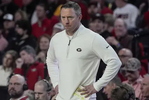 Georgia head coach Mike White watches play against Missouri during the first half of an NCAA basketball game, Saturday, Feb. 15, 2025, in Athens, Ga. (AP Photo/Mike Stewart)