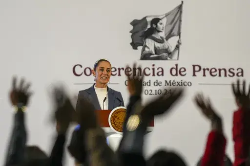 Mexican President Claudia Sheinbaum gives a media briefing at the National Palace in Mexico City, Oct. 2, 2024. (AP Photo/Fernando Llano, File)