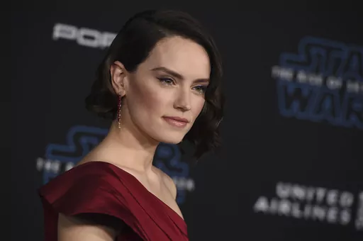 Daisy Ridley arrives at the world premiere of "Star Wars: The Rise of Skywalker" on Dec. 16, 2019, in Los Angeles. Lucasfilm announced three new live-action films in the "Star Wars" franchise which includes the return of Ridley as Rey. (Jordan Strauss/Invision/AP, File)