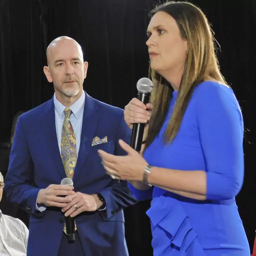 Arkansas Gov. Sarah Huckabee Sanders, right, and Arkansas Secretary of Education Jacob Oliva discuss several aspects of the LEARNS Act on Monday evening, April 24,2023, in the Simpson Theatre at Arkansas State University's Fowler Center in Jonesboro, Ark. (Nena Zimmer/The Jonesboro Sun via AP)