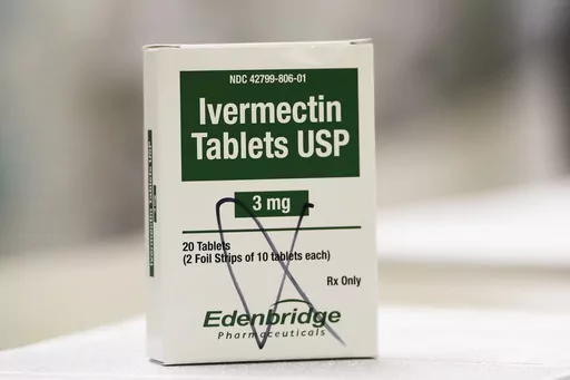 A box of ivermectin is displayed in a pharmacy Sept. 9, 2021, in Ga. Five former inmates at an Arkansas county jail have settled their lawsuit against a doctor who they said gave them the antiparasitic drug ivermectin to fight COVID-19 without their consent. (AP Photo/Mike Stewart, File)