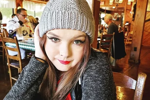 In a photo provided by Jeff Walker, 15-year-old Harleigh Walker of Auburn, Ala., is seen during a family vacation. Harleigh Walker spent the spring break trying to persuade members of the state House and Senate to reject legislation banning gender-affirming medications for transgender kids like her under 19. She was unsuccessful. On Thursday, April 7, 2022, Alabama lawmakers passed the measure, and Gov. Kay Ivey signed it into law on Friday, meaning Harleigh's doctor would face prison time if sh