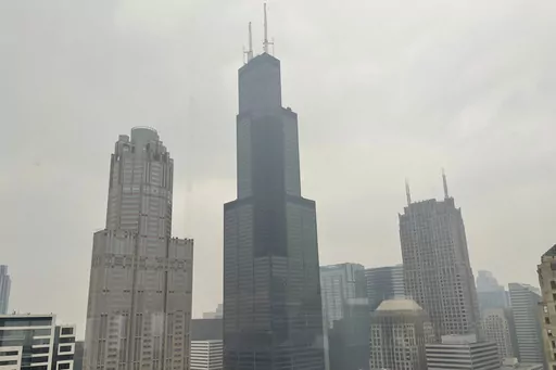 The Willis Tower (formerly Sears Tower) is pictured in downtown Chicago, where the air quality has been categorized "unhealthy" by the U.S. Environmental Protection Agency, on June 27, 2023. The EPA says extensive swaths of the northern United States awoke to unhealthy air quality Monday, July 17, or were experiencing it by midafternoon. Fine particle pollution caused by smoke from Canada’s wildfires is causing a red zone air quality index, meaning it is unhealthy for everyone. (AP Photo/Clair