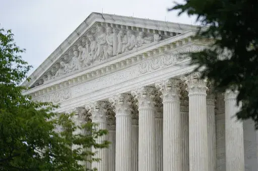 The U.S. Supreme Court building in Washington, Monday, June 27, 2022. The Supreme Court has temporarily blocked a court order that would have forced Yeshiva University to recognize an LGBTQ group as an official campus club. The court acted Friday, Sept. 9, in a brief order signed by Justice Sonia Sotomayor that indicated the court would have more to say on the topic at some point. (AP Photo/Patrick Semansky, File)