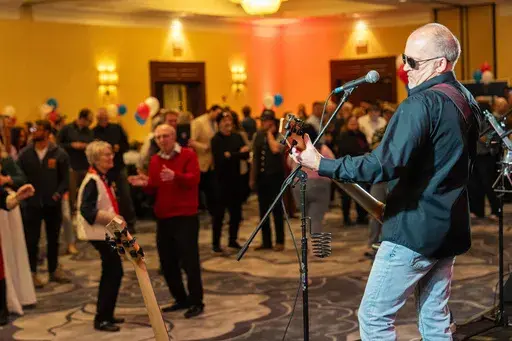 Wisconsin Supreme Court candidate Brad Schimel plays with his band "4 on the Floor" at his election night party Tuesday, April 1, 2025, in Pewaukee, Wis. (AP Photo/Andy Manis)