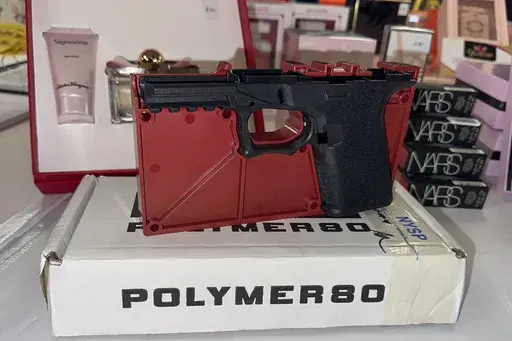 A ghost gun that police seized from an organized shoplifting crime ring is on display during a news conference at the Queens District Attorney's office in New York City, Nov. 26, 2024. (AP Photo/Ted Shaffrey, File)