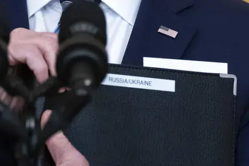 President Joe Biden holds his remarks after speaking about Ukraine in the East Room of the White House, Thursday, Feb. 24, 2022, in Washington. (AP Photo/Alex Brandon)