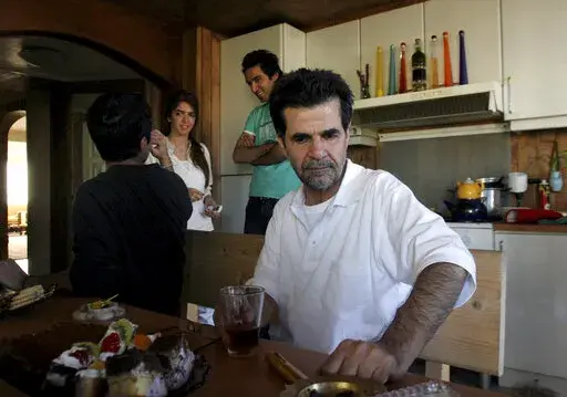 Iranian filmmaker Jafar Panahi is shown at his home after he was freed from jail on bail after more than two months in custody, in Tehran, Iran, on May 25, 2010 . Panahi who was arrested last summer, weeks before his latest film was released to widespread acclaim, has gone on hunger strike to protest his continued detention amid more than four months of anti-government protests. (AP Photo, File)