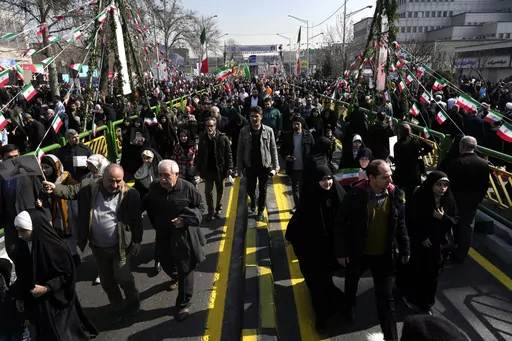 Iranians attend the annual rally commemorating the 1979 Islamic Revolution at the Azadi (Freedom) St. in Tehran, Iran, Sunday, Feb. 11, 2024. Iran marked Sunday the 45th anniversary of the 1979 Islamic Revolution amid tensions gripping the wider Middle East over Israel's continued war on Hamas in the Gaza Strip. (AP Photo/Vahid Salemi)