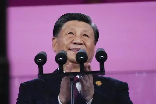 Chinese President Xi Jinping attends the opening ceremony of the 19th Asian Games in Hangzhou, China, Sept. 23, 2023. The U.S. State Department in a first-of-its-kind report has laid out Beijing's growing efforts to reshape the global narrative on China, while spending billions of dollars to do so. (AP Photo/Lee Jin-man, File)