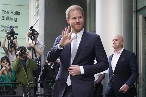 Prince Harry leaves the High Court after giving evidence in London, on June 7, 2023. Prince Harry won his phone hacking lawsuit Friday Dec. 15, 2023 against the publisher of the Daily Mirror and was awarded over 140,000 pounds ($180,000) in the first of his several lawsuits against the tabloids to go to trial. (AP Photo/Kin Cheung, File)