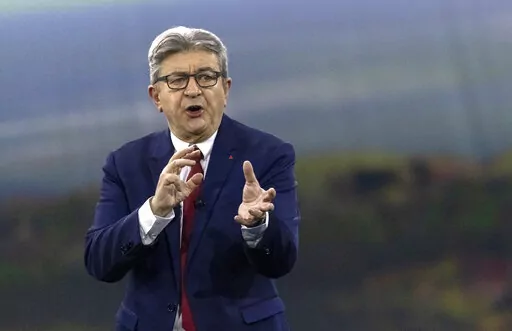 French Far-left presidential candidate for the 2022 election Jean-Luc Melenchon gestures as he speaks during a meeting in Nantes, western France, Sunday, Jan. 16, 2022. Jean-Luc Melenchon used to call Russia a "partner," even as European governments were scrambling to find ways to avert a Russian invasion of Ukraine. He now supports the Ukrainian's "resistance" and Russians who are opposing the war and fighting "dictatorship" in their own country. (AP Photo/Jeremias Gonzalez, File)