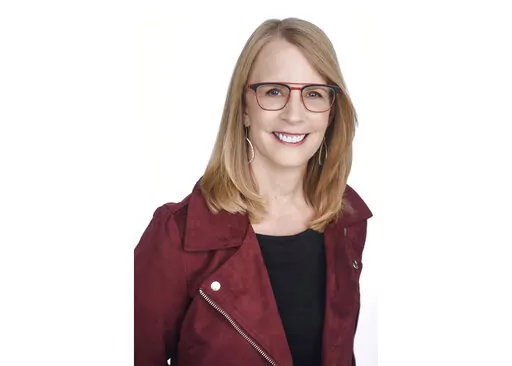 This undated file photo provided by NerdWallet shows Liz Weston, a columnist for personal finance website NerdWallet.com. Delaying the start of Social Security retirement benefits can dramatically increase your monthly benefit and your lifetime income. But how do you pay the bills in the meantime? Using your 401(k) or other retirement savings as a “bridge” may be the best option, even if it means spending down your savings at a rapid rate. (NerdWallet via AP, File)