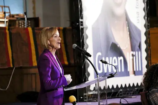 Judy Woodruff speaks at a ceremony to unveil the new Gwen Ifill Black Heritage Commemorative Forever Stamp at the Metropolitan African Methodist Episcopal Church, Thursday, Jan. 30, 2020, in Washington.  Woodruff says she plans to step down at anchor of PBS' daily ‘NewsHour’ program at the end of 2022.(AP Photo/Michael A. McCoy)