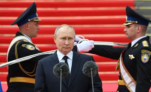 Russian President Vladimir Putin addresses members of the Defense Ministry, the National Guard, the Interior Ministry, the Federal Security Service and the Federal Guard Service at the Kremlin, in Moscow on June 27, 2023. Putin will begins his fifth term as Russian president in an opulent Kremlin inauguration on Tuesday after destroying his political opposition, launching a devastating war in Ukraine and consolidating power. (Sergei Guneyev, Sputnik, Kremlin Pool Photo via AP, File)