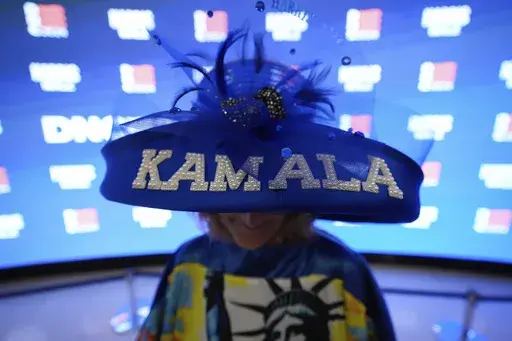 Mississippi delegate Kelly Jacobs wears a hat during the Democratic National Convention, Monday, Aug. 19, 2024, in Chicago. (AP Photo/Brynn Anderson)