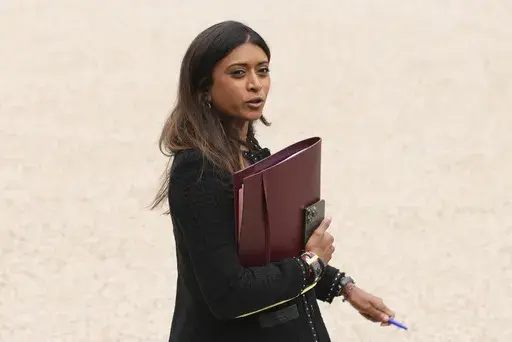 French government spokesperson Prisca Thevenot leaves the weekly cabinet meeting, Wednesday, July 3, 2024 at the Elysee Palace in Paris. French President Emmanuel Macron dissolved the National Assembly and called the snap election on June 9 after a stinging defeat at the hands of the National Rally in French voting for the European Parliament. The unpopular president gambled that the far right would not repeat that success when France's own fate was in the balance. (AP Photo/Thomas Padilla)