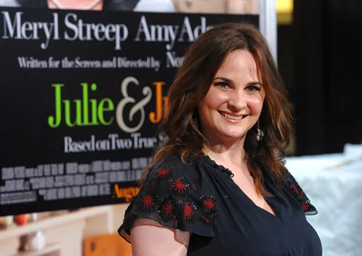 Author Julie Powell attends the premiere of "Julie & Julia" at The Ziegfeld Theatre, in New York, on July 30, 2009. Powell, who became an internet darling after blogging for a year about making every recipe in Julia Child’s “Mastering the Art of French Cooking,” leading to a book deal and a film adaptation, died of cardiac arrest on Oct. 26, 2022, at her home in upstate New York. She was 49. (AP Photo/Peter Kramer, File)