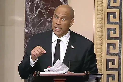 In this image provided by Senate Television, Sen, Cory Booker, D-N.J. speaks on the Senate floor, Tuesday morning, April 1, 2025. (Senate Television via AP)
