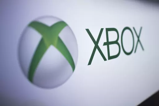 The Xbox logo is pictured at the Paris Games Week in Paris, Nov. 3, 2017. Several exclusive Xbox games will be soon making their way to rival consoles, the video gaming brand and its parent company Microsoft announced Thursday, Feb. 15, 2024. (AP Photo/Kamil Zihnioglu, File)