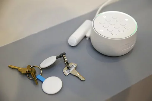 FILE- In this Sept. 20, 2017, file photo the Nest Secure alarm system is seen on display during an event in San Francisco.  Smart-home technology isn’t just about comfort and convenience. Devices like water leak sensors, smart smoke detectors and motion sensors could also get you a discount on your homeowners insurance policy.  (AP Photo/Eric Risberg, File)