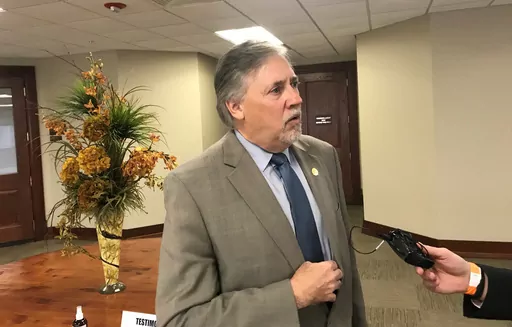 Arkansas state Rep. Mark Lowery, R-Maumelle, speaks to reporters at the state Capitol in Little Rock, Ark., Feb. 1, 2021. Lowery, now Arkansas treasurer, is recovering in Maryland after having a stroke last month, his office announced on Friday, April 7, 2023. (AP Photo/Andrew DeMillo, File)