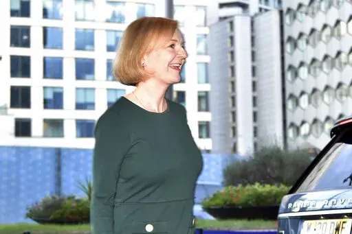 Britain's Prime Minister Liz Truss arrives to attend the Conservative Party conference at the ICC, in Birmingham, England, Saturday, Oct. 1, 2022. (AP Photo/Rui Vieira)