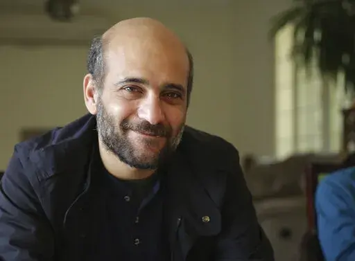 In this undated image from the Free Ramy Shaath Facebook page, Ramy Shaath poses for a phhoto Jan. 2, 2015, in Cairo, Egypt. Shaath, who was released from an Egyptian jail last month, is an outspoken opponent of Arab dictatorship and Israeli rule over the Palestinians, and is part of a generation of activists who see them as two sides of the same coin. It’s not known why exactly Egyptian authorities confined him to a packed and filthy cell for over two and a half years, but his brand of rights