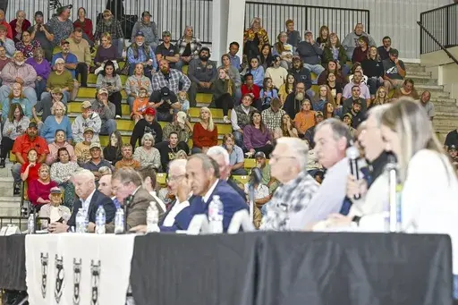 Residents and stakeholders attend a town hall meeting to discuss Gov. Sarah Huckabee Sanders' plan to build a new 3,000-bed prison near Vesta in Franklin County, on Thursday, Nov, 7, 2024, at the Charleston High School gymnasium in Charleston, Ark. (Hank Layton/River Valley Democrat-Gazette via AP)