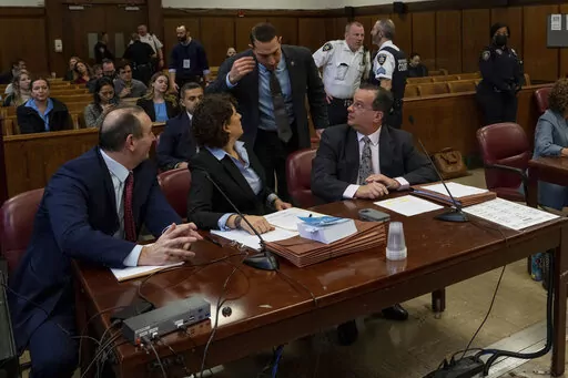 Prosecuting and Defense attorneys wait during the sentencing of the Trump Organization at Manhattan Criminal Court on Friday, Jan. 13, 2023, in New York. (Adam Gray/DailyMail via AP, Pool)