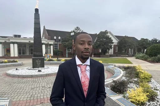 Chad Preston, a senior political science major at Florida AM University, poses for a photo before class on Sept. 27, 2023 in Tallahassee, Fla. A core mission of Florida A&M University from its founding over a century ago has been to educate African Americans. It was written into the law that established the school along with another college, in Gainesville, reserved for white students. At Florida's only public HBCU, some students now fear political constraints might get in the way of teaching pa