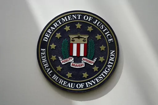 The FBI seal is pictured in Omaha, Neb., Aug. 10, 2022. A sharply divided privacy oversight board is recommending that the FBI and other agencies be required to get court approval before reviewing the communications of U.S. citizens collected through a secretive foreign surveillance program. (AP Photo/Charlie Neibergall, File)