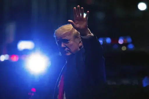 Former President Donald Trump arrives at Trump Tower, late Tuesday, Aug. 9, 2022, in New York. (AP Photo/Yuki Iwamura)