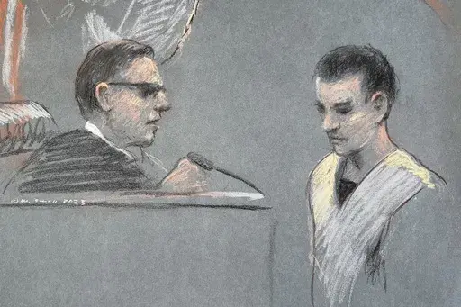 This artist depiction shows Massachusetts Air National Guardsman Jack Teixeira, right, appearing in U.S. District Court in Boston, April 14, 2023. (Margaret Small via AP, File)