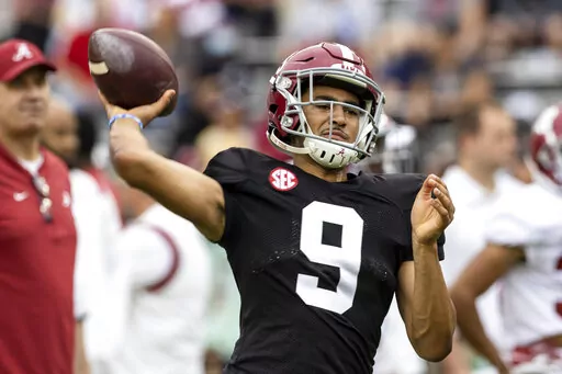 Alabama quarterback Bryce Young (9) throws before Alabama's A-Day NCAA college football scrimmage on April 16, 2022, in Tuscaloosa, Ala. Led by the Heisman Trophy-winning quarterback, the Crimson Tide are preseason No. 1 and looking every bit a contender for the seventh national championship of coach Nick Saban’s tenure.(AP Photo/Vasha Hunt, File)