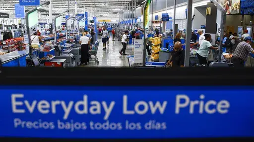 Customers use self check out at a Walmart Superstore in Secaucus, New Jersey, July 11, 2024. (AP Photo/Eduardo Munoz Alvarez, File)
